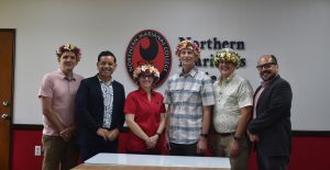 Group photo of WICHE officials visiting the Northern Marianas College. 